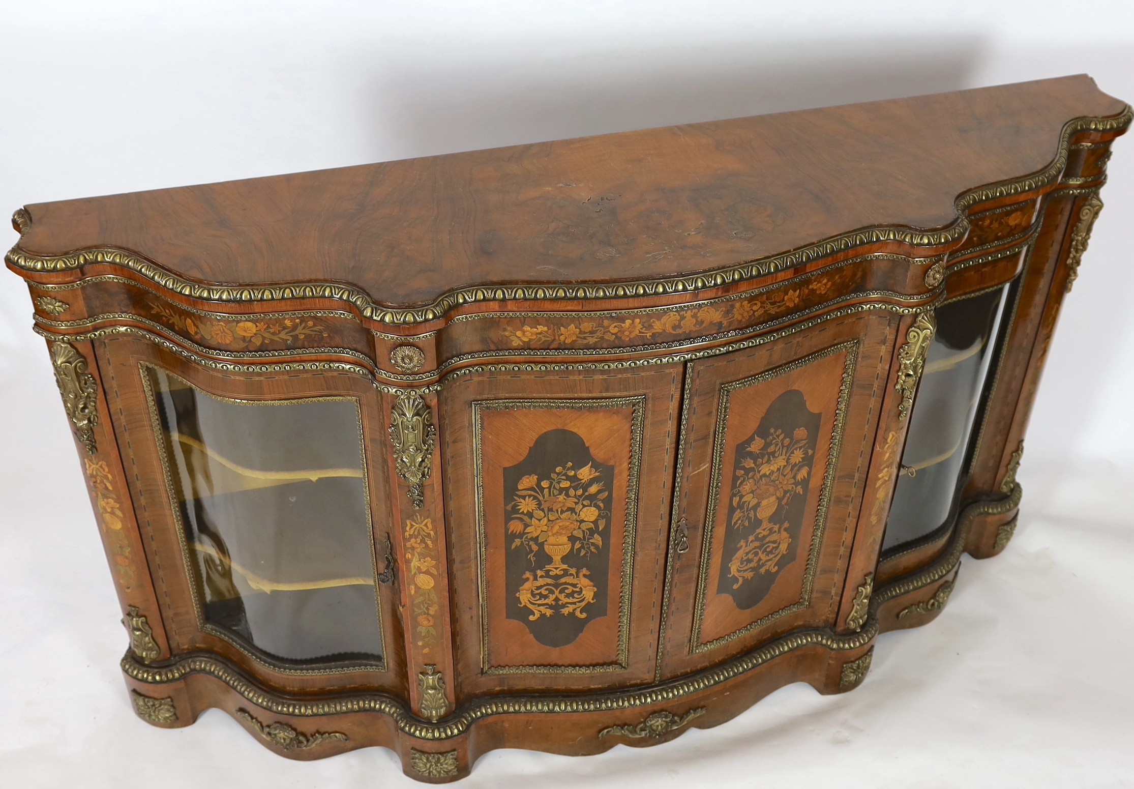 A Victorian marquetry inlaid walnut serpentine credenza, W.201cm D.48cm H.113.5cm